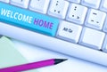 Handwriting text Welcome Home. Concept meaning Expression Greetings New Owners Domicile Doormat Entry White pc keyboard