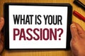 Handwriting text What'S Your Passion Question. Concept meaning asking someone about his dreams and hopes Hand hold showing colorf Royalty Free Stock Photo