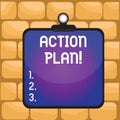 Handwriting text writing Action Plan. Concept meaning proposed strategy or course of actions for certain time Clipboard