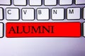 Handwriting text writing Alumni. Concept meaning Alum Old graduate Postgraduate Gathering College Academy Celebration Keyboard red Royalty Free Stock Photo