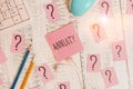 Handwriting text writing Annuity. Concept meaning fixed sum of money paid to someone each year Series of payments Writing tools,
