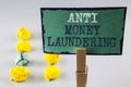 Handwriting text writing Anti Monay Laundring. Concept meaning entering projects to get away dirty money and clean it written on S Royalty Free Stock Photo