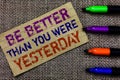 Handwriting text writing Be Better Than You Were Yesterday. Concept meaning try to improve yourself everyday Paperboard computer m
