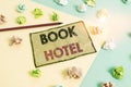 Handwriting text writing Book Hotel. Concept meaning an arrangement you make to have a hotel room or accommodation Royalty Free Stock Photo