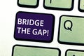 Handwriting text writing Bridge The Gap. Concept meaning Overcome the obstacles Challenge Courage Empowerment Keyboard