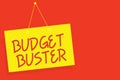 Handwriting text writing Budget Buster. Concept meaning Carefree Spending Bargains Unnecessary Purchases Overspending Yellow board