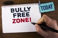 Handwriting text writing Bully Free Zone Motivational Call. Concept meaning creating abuse free school college life written by Man