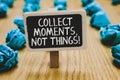 Handwriting text writing Collect Moments, Not Things. Concept meaning Happiness philosophy enjoy simple life facts Stand blackboar Royalty Free Stock Photo