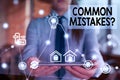 Handwriting text writing Common Mistakes Question. Concept meaning repeat act or judgement misguided making something Royalty Free Stock Photo