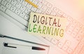Handwriting text writing Digital Learning. Concept meaning accompanied by technology or by instructional practice White keyboard Royalty Free Stock Photo