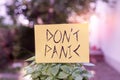 Handwriting text writing Don T Panic. Concept meaning to avoid sudden uncontrollable fear or anxiety Keep calm Plain