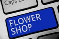 Handwriting text writing Flower Shop. Concept meaning where cut flowers are sold with decorations for gifts Keyboard blue key Inte Royalty Free Stock Photo