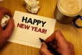 Handwriting text writing Happy New Year Motivational Call. Concept meaning Greeting Celebrating Holiday Fresh Start Man holding pe