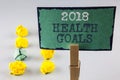 Handwriting text writing 2018 Health Golas. Concept meaning new year plan Workout healthy food Resolution goals written on Sticky Royalty Free Stock Photo