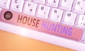 Handwriting text writing House Hunting. Concept meaning the act of searching or looking for a house to buy or rent Royalty Free Stock Photo