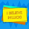 Handwriting text writing I Believe In Luck. Concept meaning To have faith in lucky charms Superstition thinking Pile of