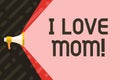 Handwriting text writing I Love Mom. Concept meaning Good feelings for their own mother Tenderness