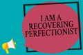 Handwriting text writing I Am A Recovering Perfectionist. Concept meaning Obsessive compulsive disorder recovery Megaphone loudspe