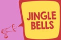 Handwriting text writing Jingle Bells. Concept meaning Most famous traditional Christmas song all over the world Megaphone loudspe