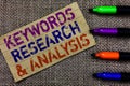 Handwriting text writing Keywords Research and Analysis. Concept meaning search for data and create tables graphs Paperboard compu Royalty Free Stock Photo