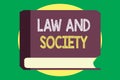 Handwriting text writing Law And Society. Concept meaning Address the mutual relationship between law and society