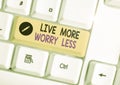 Handwriting text writing Live More Worry Less. Concept meaning Have a good attitude motivation be careless enjoy life. Royalty Free Stock Photo