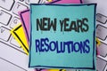 Handwriting text writing New Year 'S Resolutions. Concept meaning Goals Objectives Targets Decisions for next 365 days written on