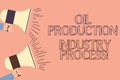 Handwriting text writing Oil Production Industry Process. Concept meaning Petroleum company industrial processing Two Hu Royalty Free Stock Photo