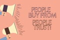 Handwriting text writing People Buy From People They Trust. Concept meaning Building trust and customer satisfaction Two Royalty Free Stock Photo