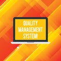 Handwriting text writing Quality Management System. Concept meaning formalized system that documents processes Laptop Monitor