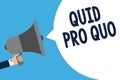 Handwriting text writing Quid Pro Quo. Concept meaning A favor or advantage granted or expected in return of something Man holding