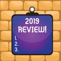 Handwriting text writing 2019 Review. Concept meaning remembering past year events main actions or good shows Clipboard