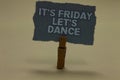 Handwriting text writing It s is Friday Let s is Dance. Concept meaning Celebrate starting the weekend Go party Disco Music Paperc