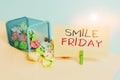 Handwriting text writing Smile Friday. Concept meaning used to express happiness from beginning of fresh week Trash bin crumpled