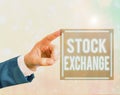 Handwriting text writing Stock Exchange. Concept meaning the place where showing buy and sell stocks and shares