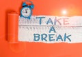 Handwriting text writing Take A Break. Concept meaning Resting Stop doing something recreation time get out of work Royalty Free Stock Photo