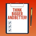 Handwriting text writing Think Bigger And Better. Concept meaning Have more great successful ideas Development Blank