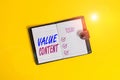 Handwriting text writing Value Content. Concept meaning Quality content writing to get good on search engine rankings Dark leather Royalty Free Stock Photo