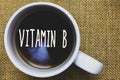 Handwriting text writing Vitamin B. Concept meaning Highly important sources and benefits of nutriments folate Mug coffee thoughts