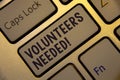 Handwriting text writing Volunteers Needed Motivational Call. Concept meaning Social Community Charity Volunteerism Golden keyboar