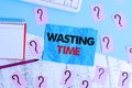 Handwriting text writing Wasting Time. Concept meaning act of spending time doing something that is unnecessary Writing