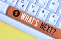 Handwriting text writing What S Next. Concept meaning Asking whatever comes immediately after the present one White pc Royalty Free Stock Photo