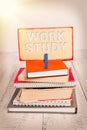 Handwriting text writing Work Study. Concept meaning college program that enables students to work parttime pile stacked books Royalty Free Stock Photo