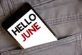 Handwriting text writing Hello June. Concept meaning Starting a new month message May is over Summer startingConcept on cell phone