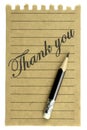Handwriting Thank you on a natural note paper and pencil Royalty Free Stock Photo