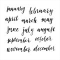 Handwritten brush calligraphy, month names on white background