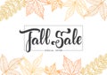 Handwritten brush lettering of Fall Sale on foliage background. Discount special offer.