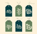 Handwritten calligraphy lettering text 2020. Collection Merry Christmas vector gift tags and bundle decorative xmas