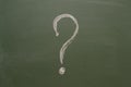 Handwritten chalk inscription question mark on green board