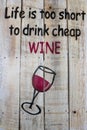 Handwritten decorative Wine tasting sign on a small rustic wooden plank